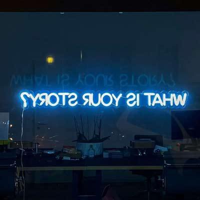 Neon sign: What is your story?